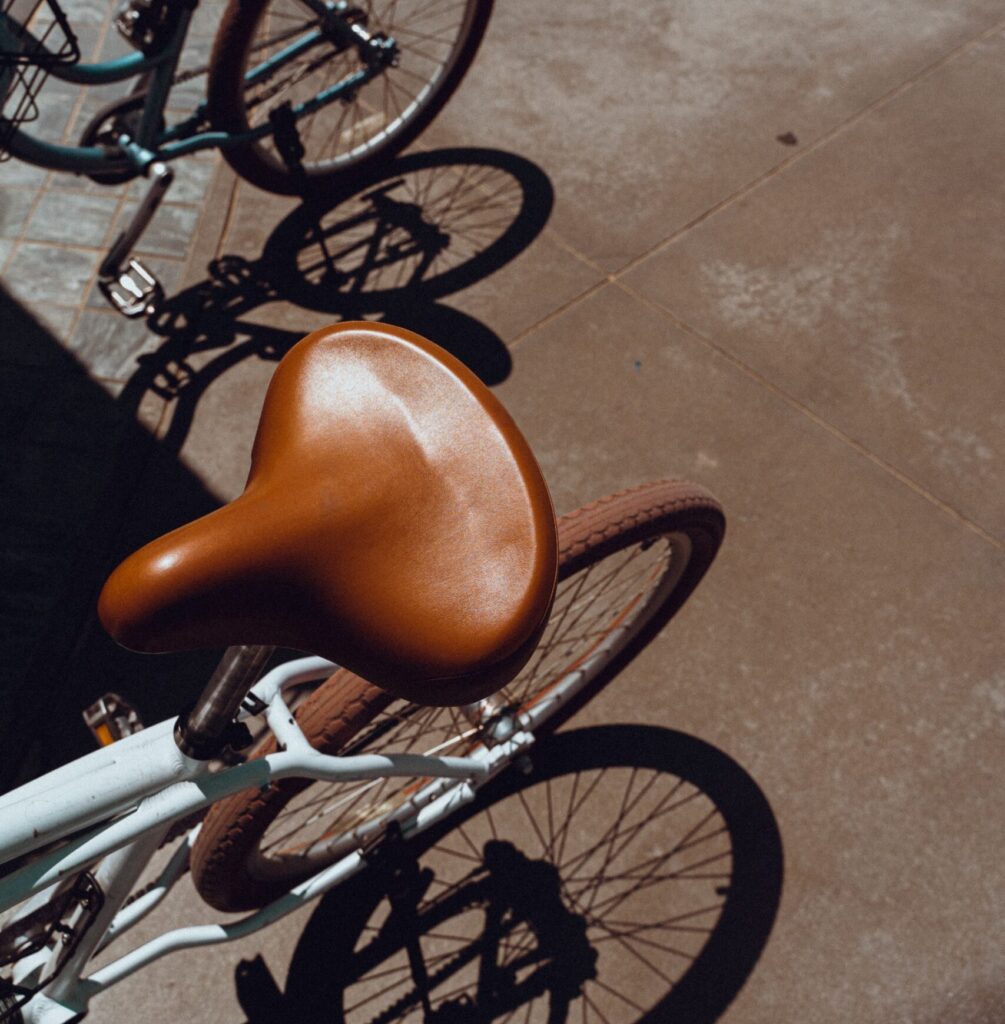 A wide beach cruiser saddle provides cushioning and support for relaxed riding posture